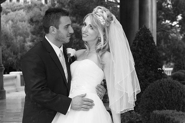 Romantic black and white portrait of bride and groom on wedding day