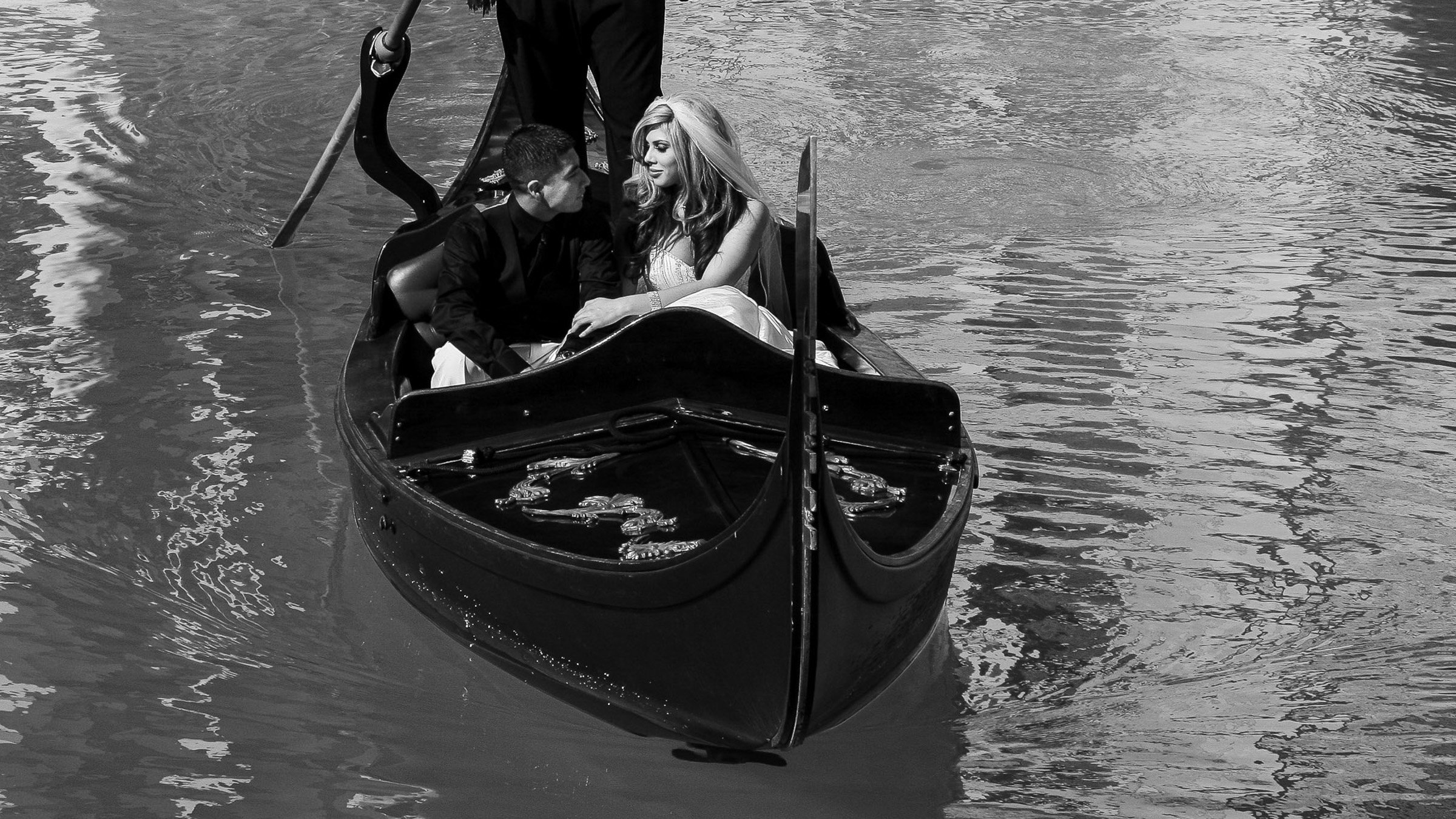 Black and white Las Vegas luxury elopement couple riding gondola in editorial wedding portrait
