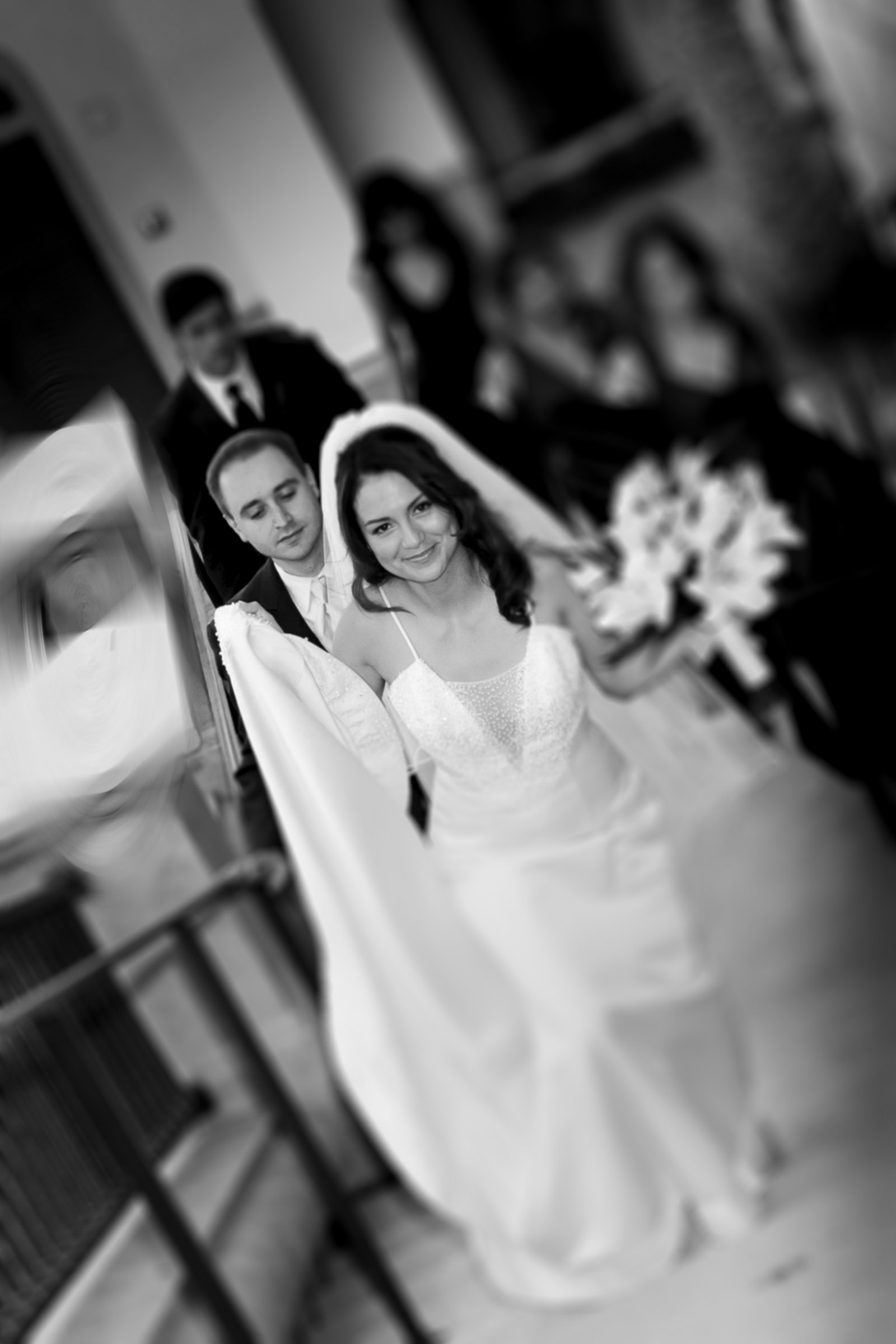 Bride and groom walking up stairs at Hilton Lake Las Vegas Resort in a quiet, elegant moment