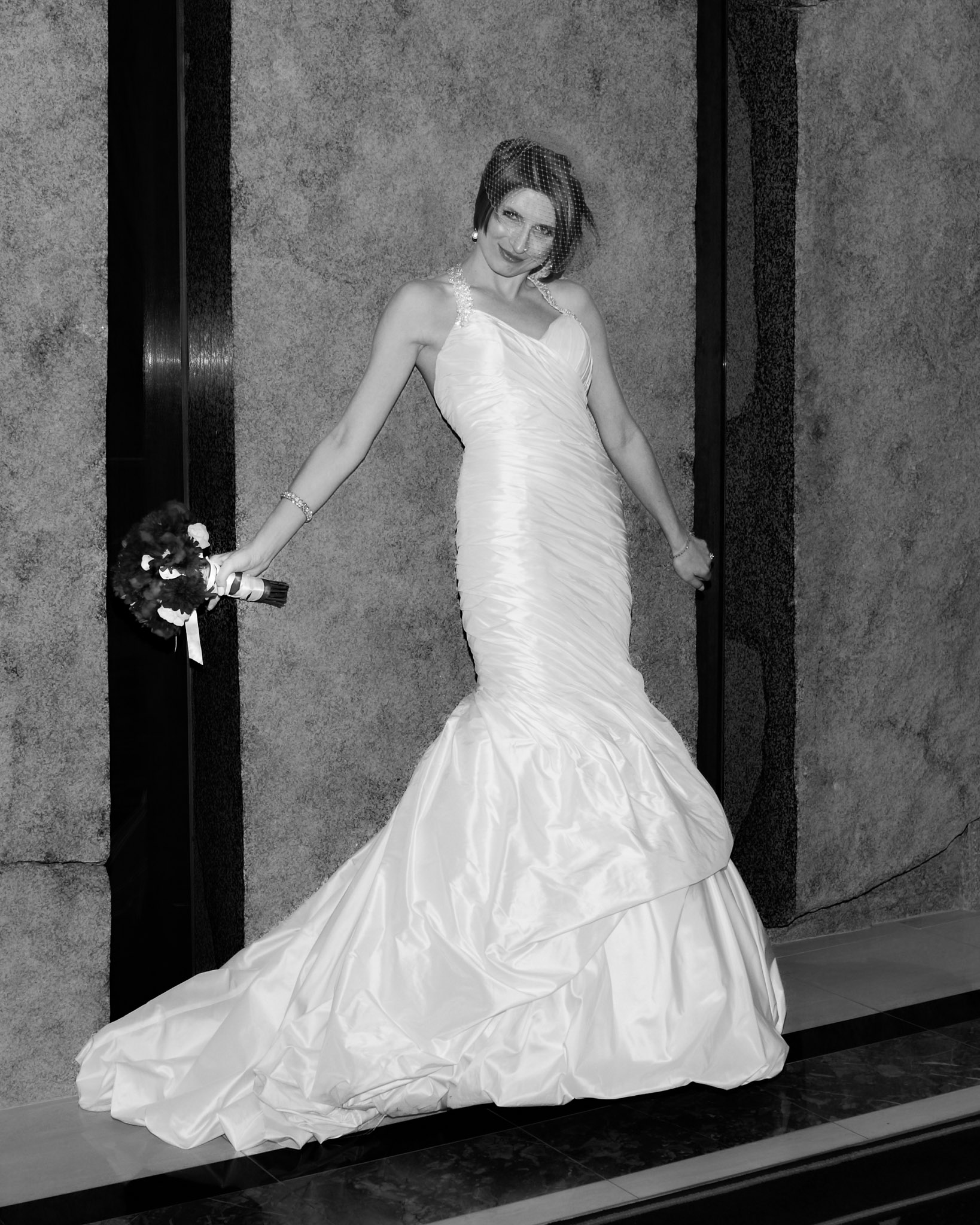 Las Vegas wedding photographer editorial bridal portrait of bride in elegant gown at Bellagio hotel