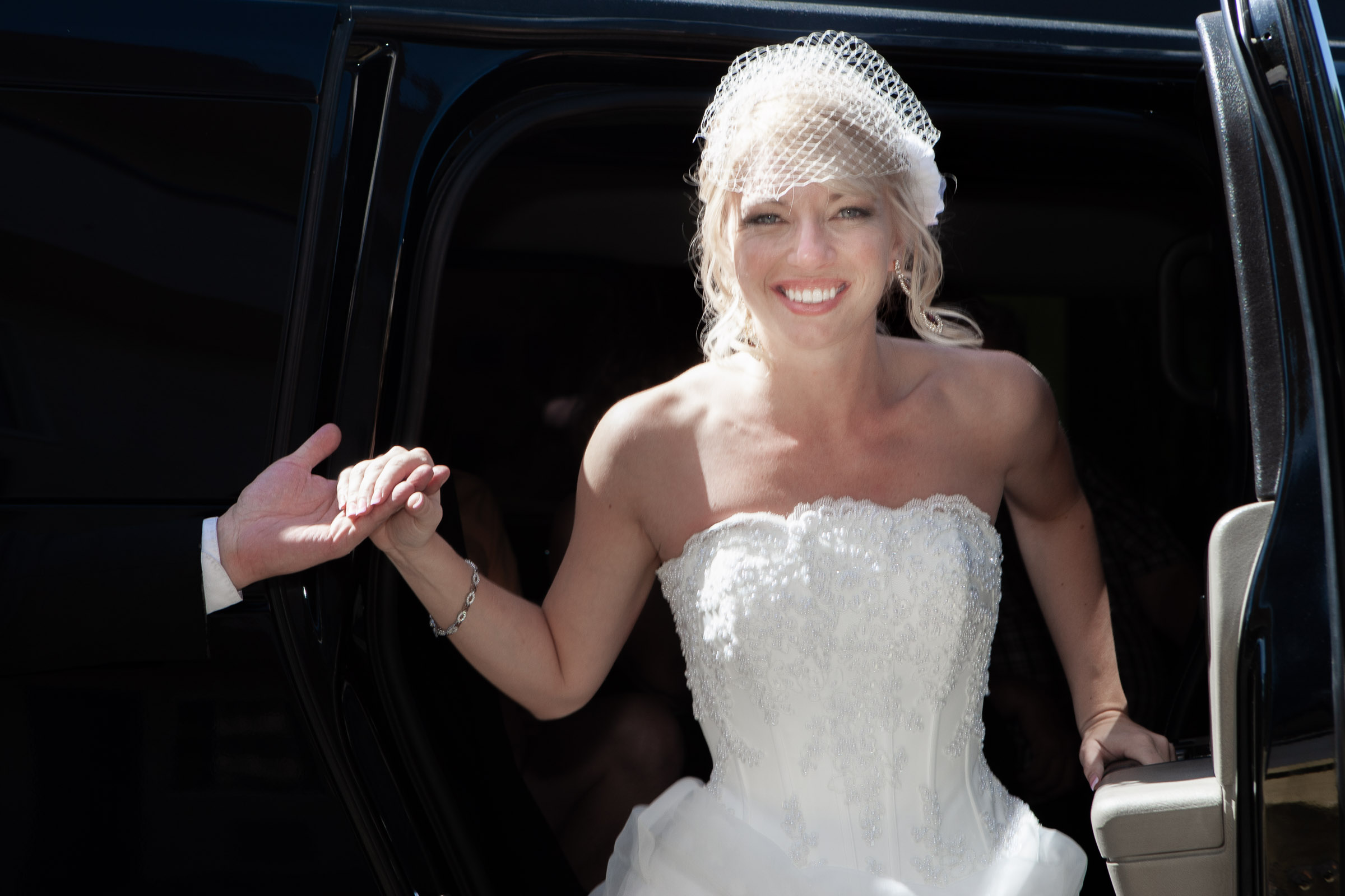 Destination wedding bride arriving by limo in Las Vegas captured in an elegant editorial wedding photography style