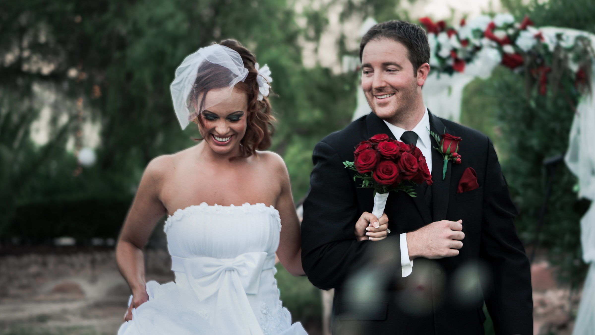 Bride and groom walking together in Sonoma County captured in a fashion-forward editorial wedding photography style