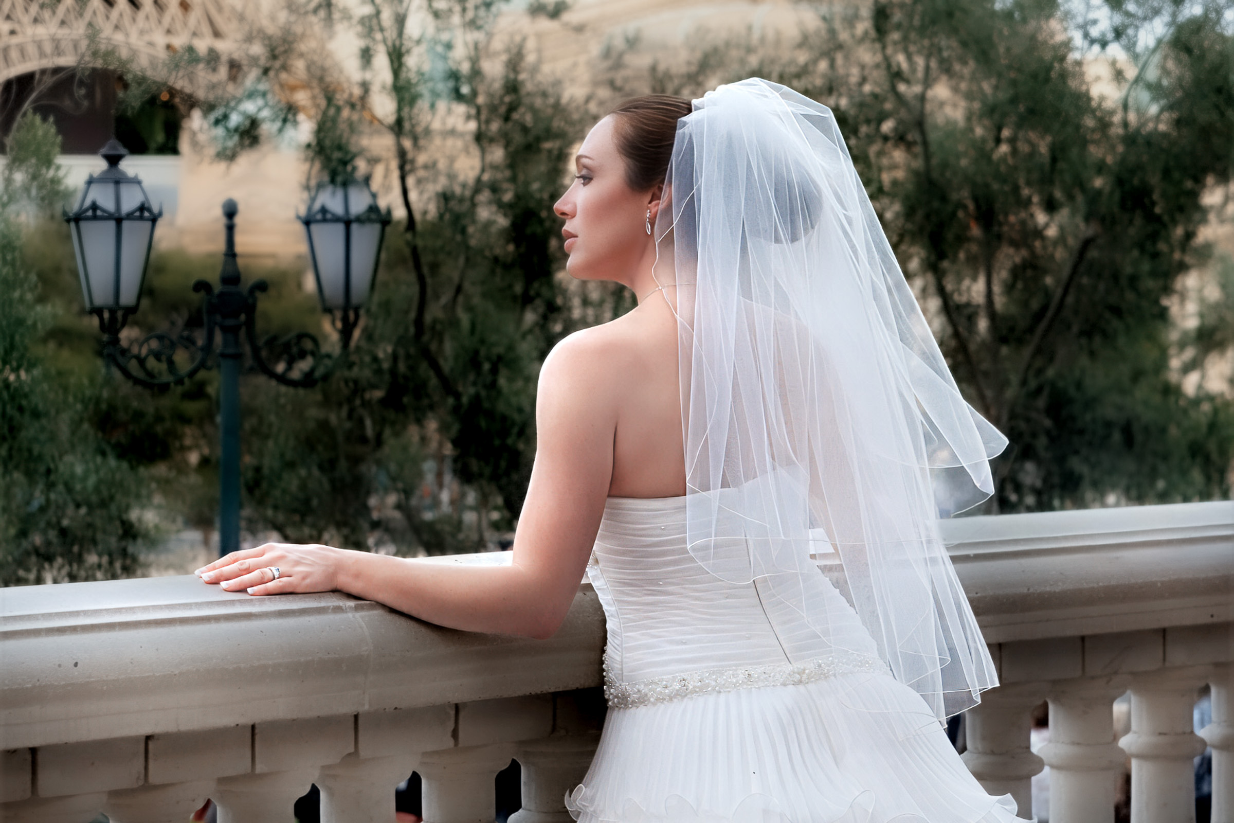Bride portrait on balcony with veil, Napa Valley wedding photographer Theresa Chavarria