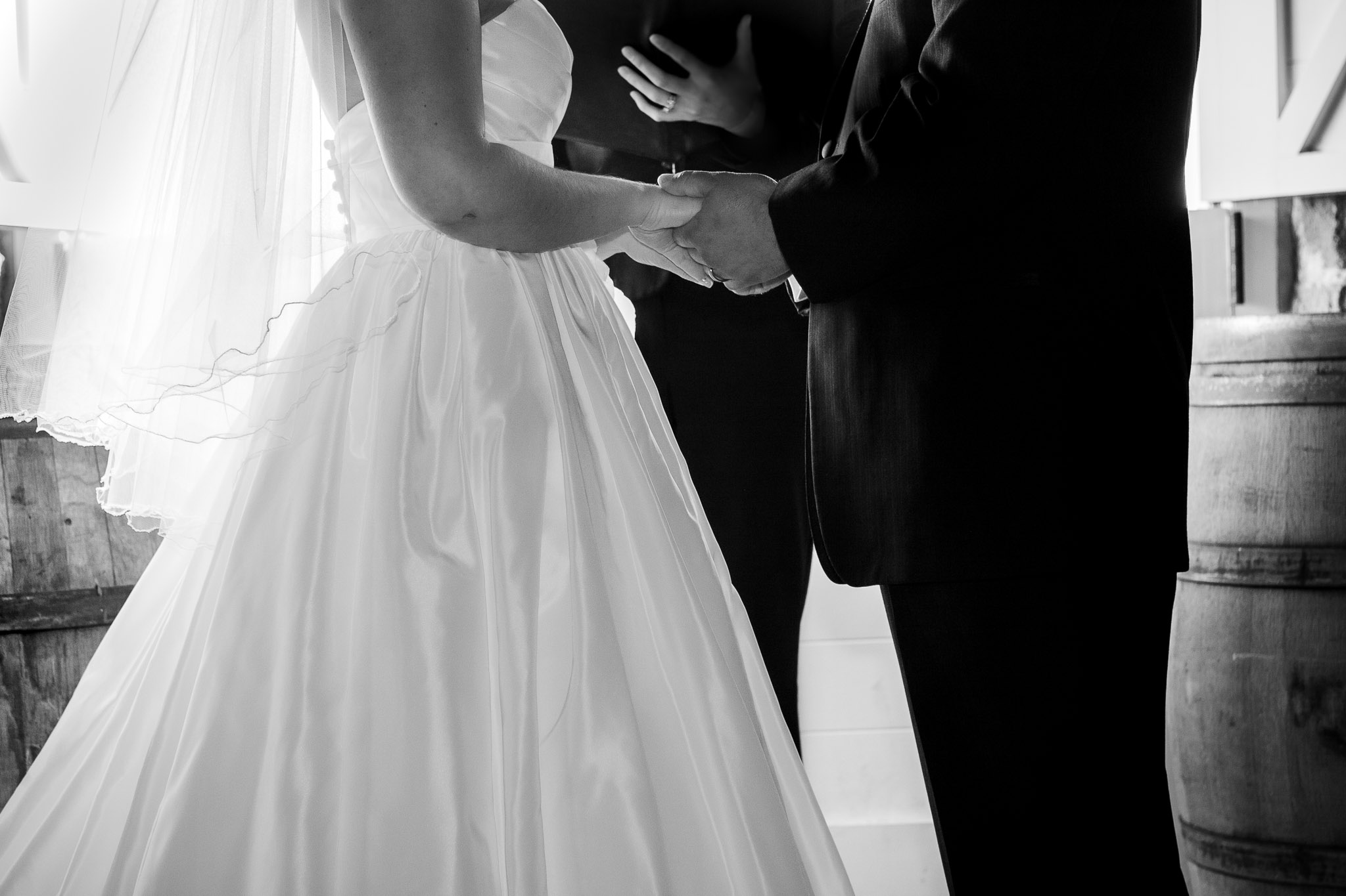 Napa Valley wedding photography capturing an intimate moment between bride and groom in a refined black and white style
