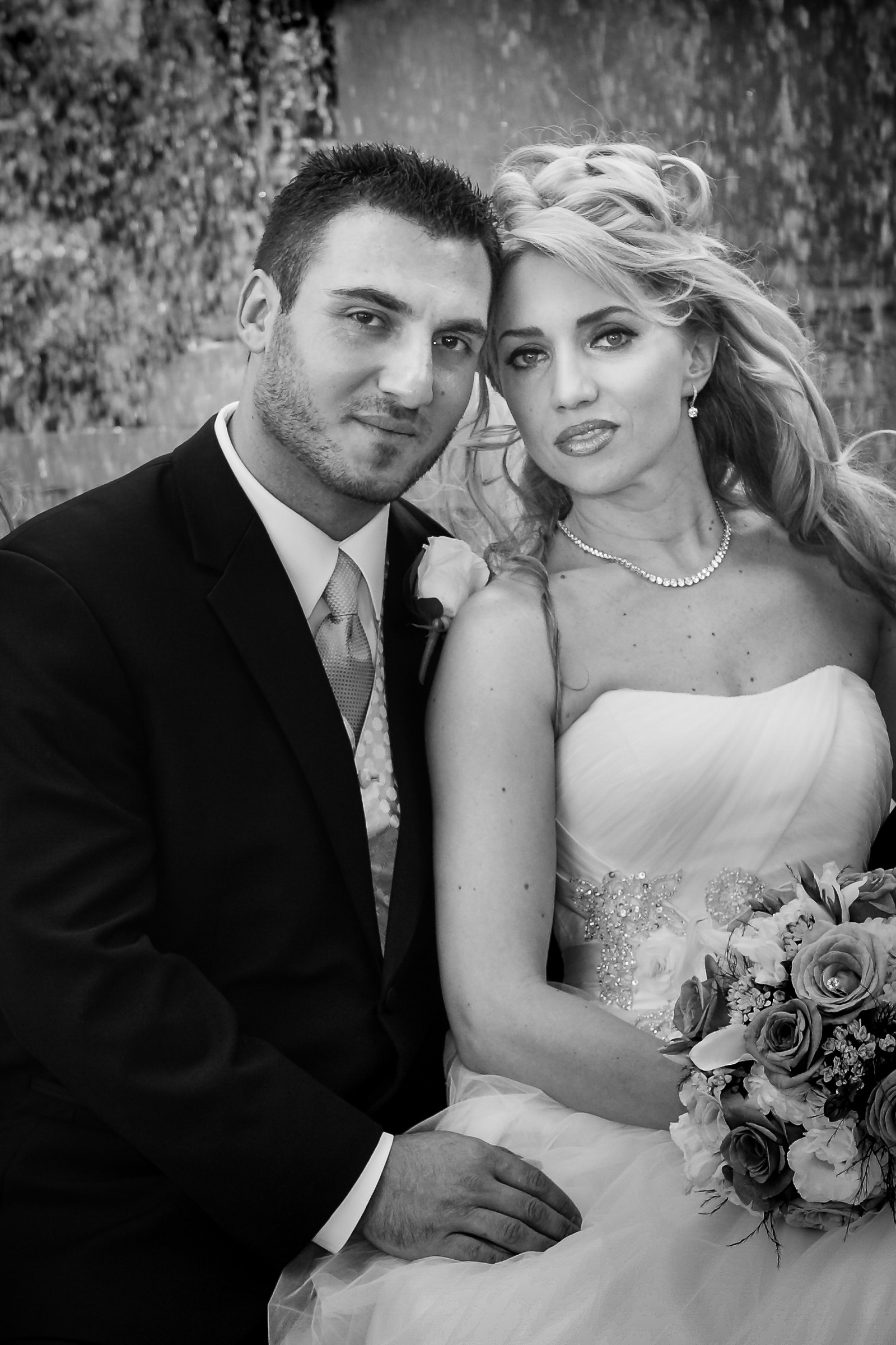 Classic wedding portrait of bride and groom seated together, timeless Las Vegas wedding photography