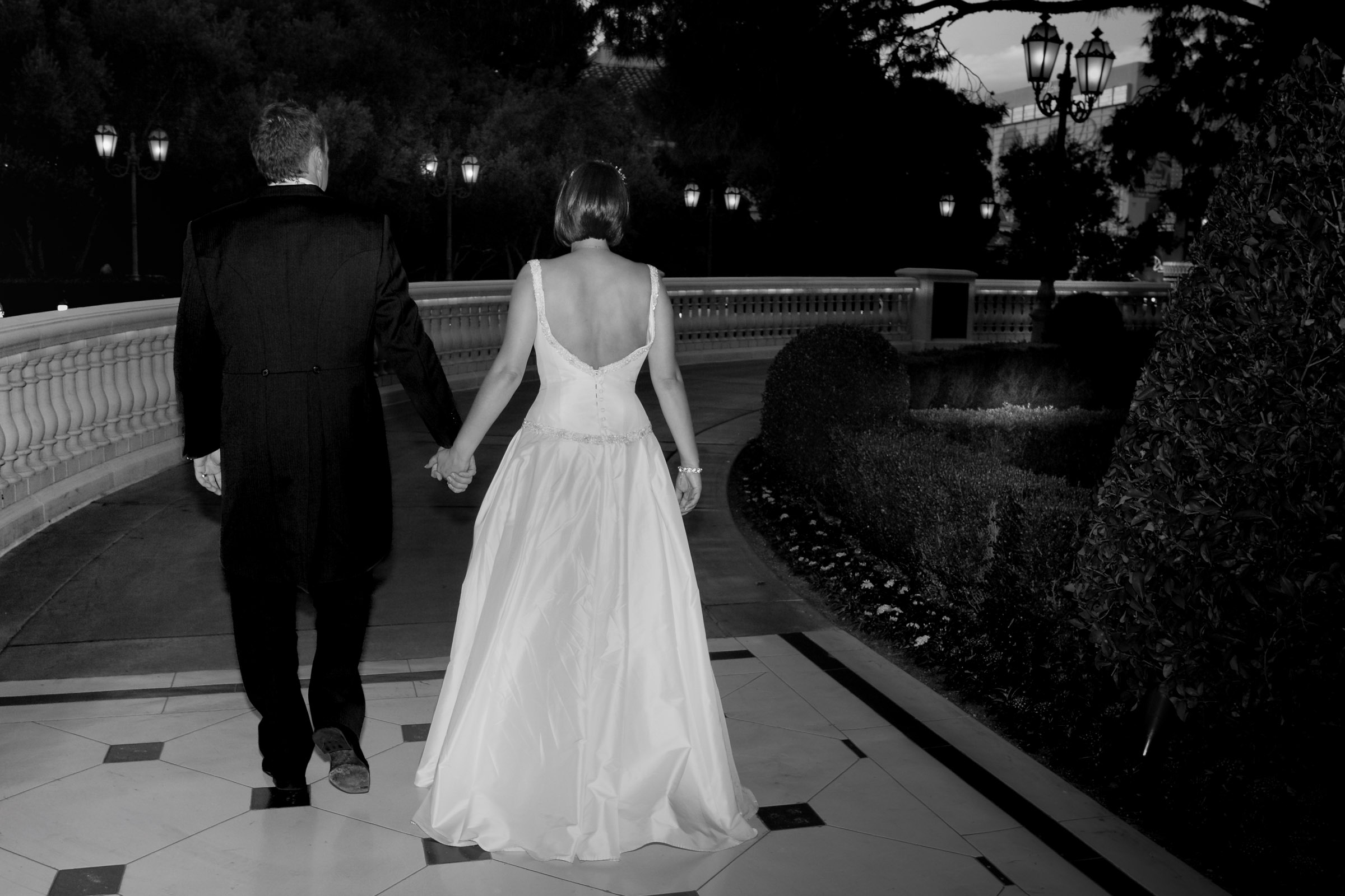 UK couple private destination elopement at Bellagio Las Vegas captured in a cinematic editorial candid style at night