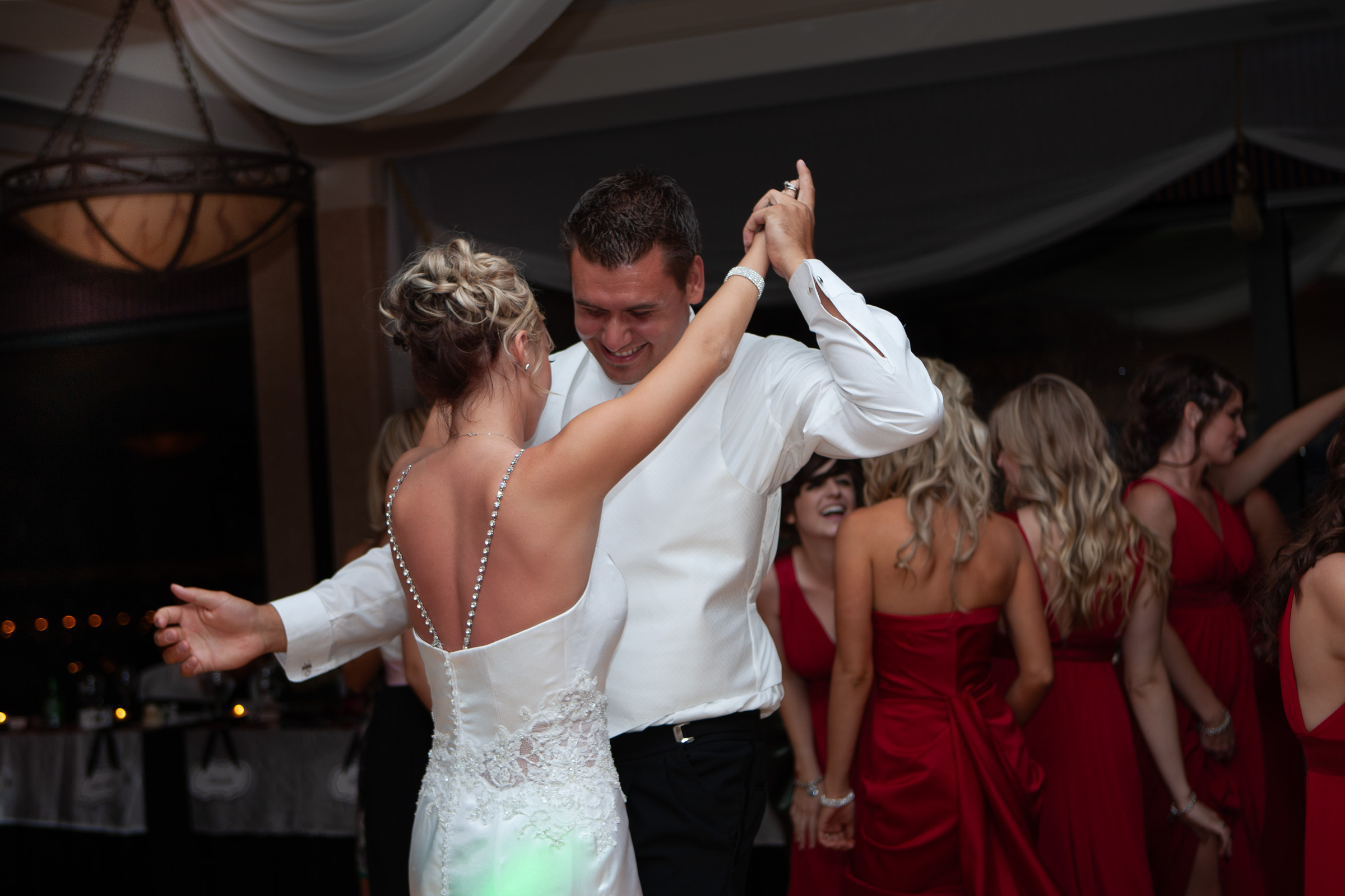 Bride and groom dancing at their wedding reception